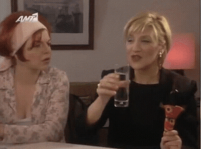 Women Sitting At Table With Water And Stuffed Animal GIF