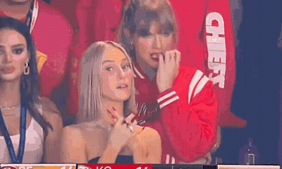 Women Sitting In Stadium Watching Game GIF