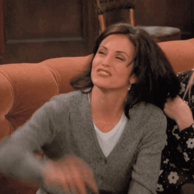 Women Sitting On Couch GIF