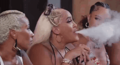 Women Smoking Electronic Cigarettes GIF