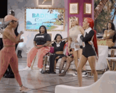 Women Standing In Front Of Baddies Screen GIF