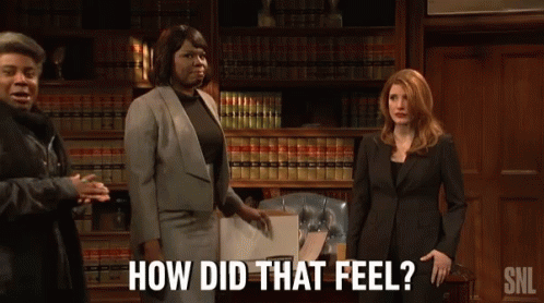 Women Standing In Front Of Bookshelf How Did That Feel GIF