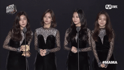 Women Standing In Front Of Mnet Sign GIF
