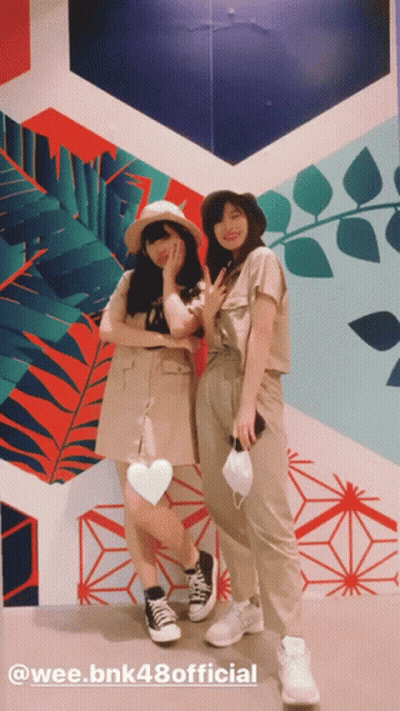 Women Standing In Front Of Wee.bnk48 Official GIF