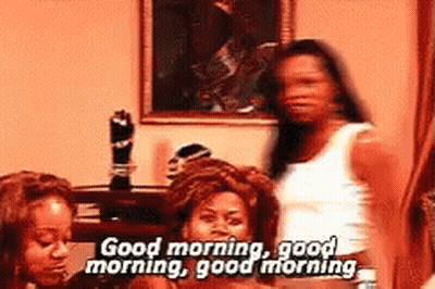Women Standing In Room Saying Good Morning GIF