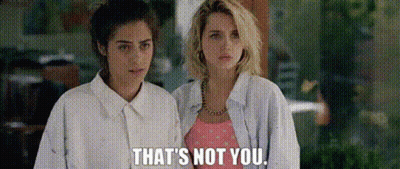 Women Standing Next To Each Other GIF