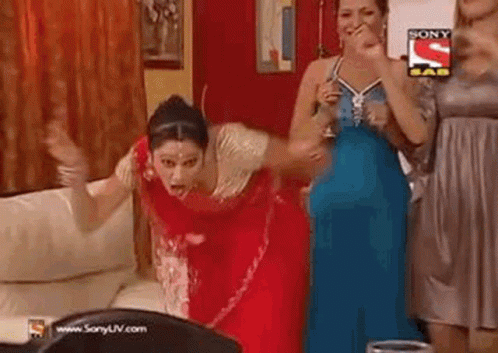 Women Standing Together In A Room GIF