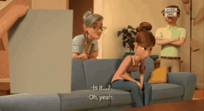 Women Talking On Couch GIF