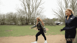Women Walking Fast To Reach Finish Line GIF