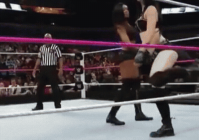Women Wrestling In Ring With Referee GIF