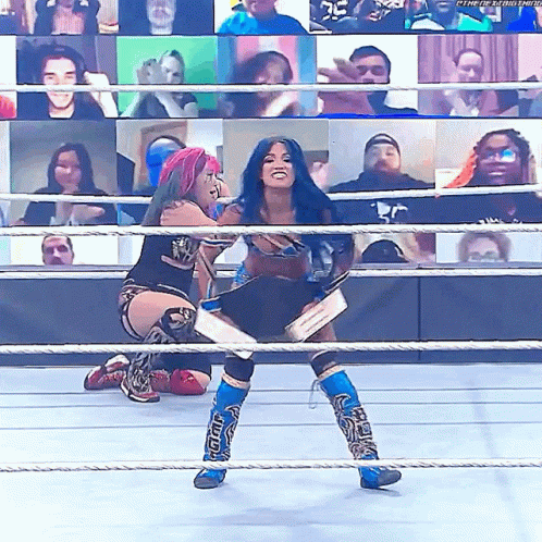 Women Wrestling In Ring With Smackdown Boot GIF