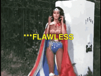 Wonder Woman Costume Standing In Front Of Refrigerator Flawless GIF