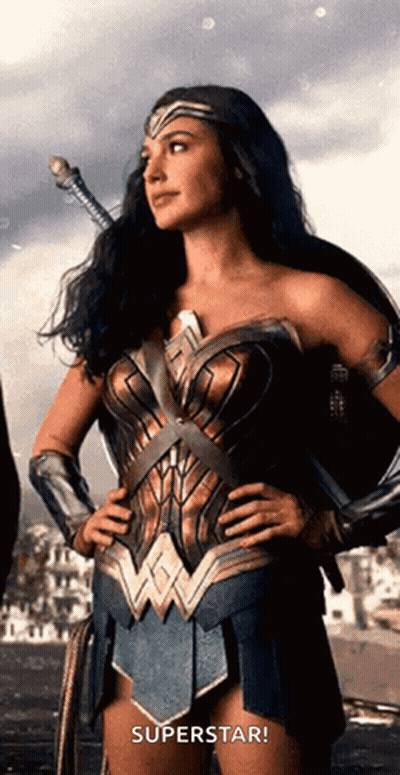 Wonder Woman Hands On Hips Holding Sword GIF