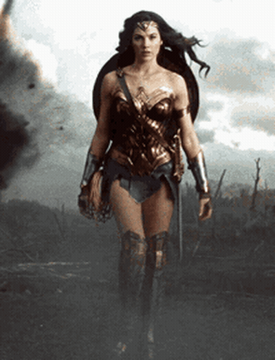 Wonder Woman Walking In Field With Sword And Shield GIF