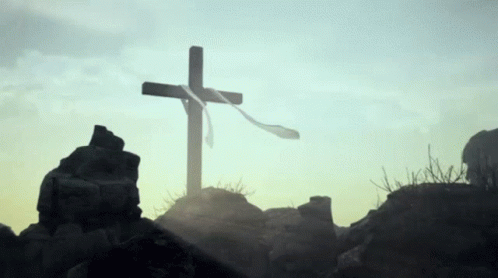 Wooden Cross On Rocky Hill GIF