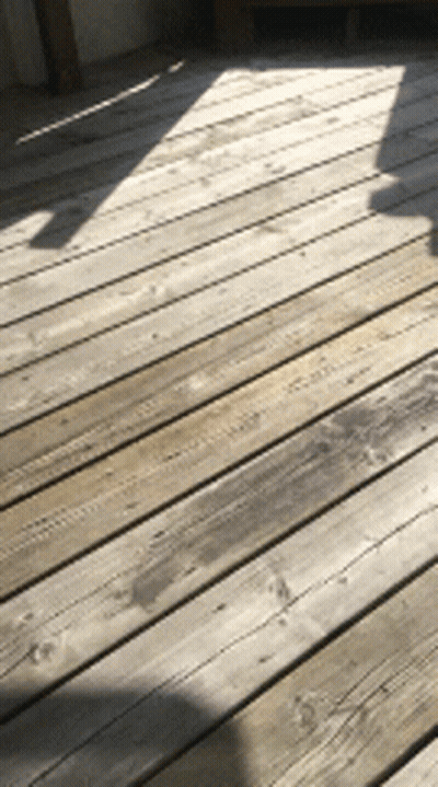 Wooden Deck With Chair Shadow GIF