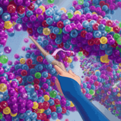Wooden Magic Wand Targeting Colorful Ballons GIF