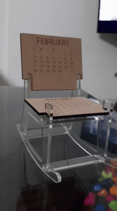 Wooden Rocking Chair With February Calendar GIF