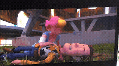 Woody And Bo Peep Laying On Ground GIF