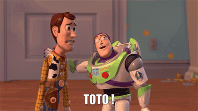 Woody And Buzz Lightyear From Toy Story Standing Next To Each Other With Toto Everywhere Written On The Bottom GIF