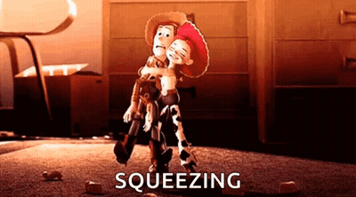 Woody And Jessie From Toy Story Are Squeezing Each Other . GIF