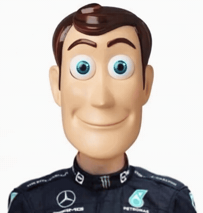 Woody Doll In Mercedes Racing Suit GIF