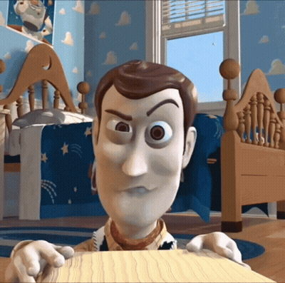 Woody From Toy Story Is Looking At The Camera GIF