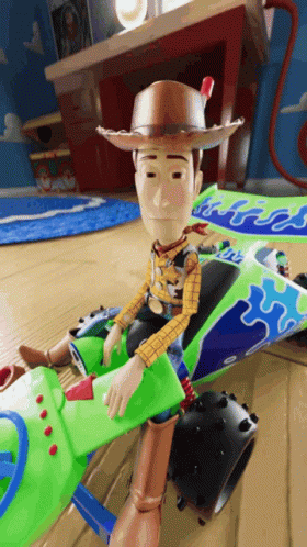 Woody From Toy Story Is Sitting In A Green Toy Car GIF