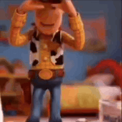 Woody From Toy Story Is Taking A Picture Of Himself With His Hands . GIF