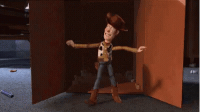 Woody From Toy Story Standing In Cardboard Box Holding Cowboy Hat GIF