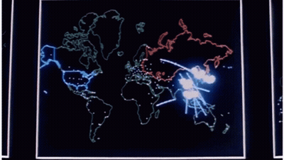 World Map On Computer Screen With Lines GIF
