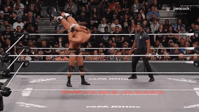 Wrestler Being Lifted In Ring GIF
