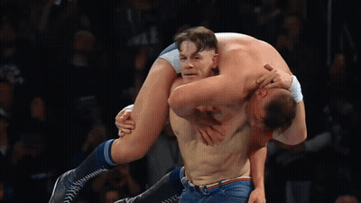 Wrestler Carrying Another Wrestler On Shoulders GIF