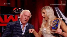 Wrestler Charlotte Flair Ric Flair Woo Fist Bump GIF