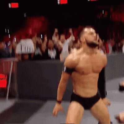 Wrestler Dancing in Front of Crowd