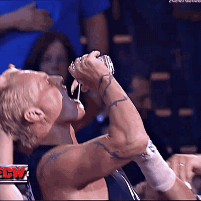 Wrestler Drinking From Can Before Crowd GIF