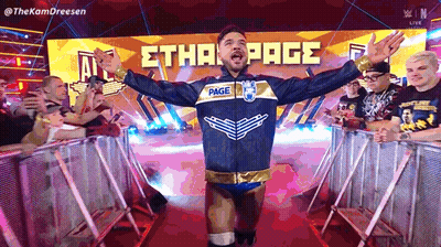 Wrestler Ethan Page Arms Outstretched Before Crowd