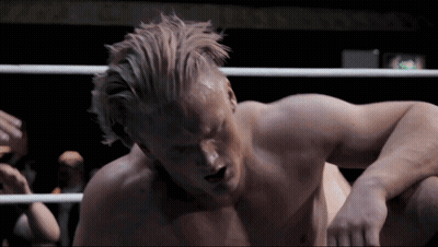 Wrestler Falling Through Ring As Referee Watches GIF