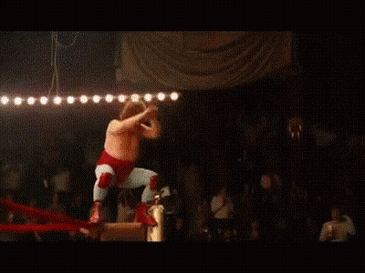 Wrestler Flying Through Air In Ring GIF