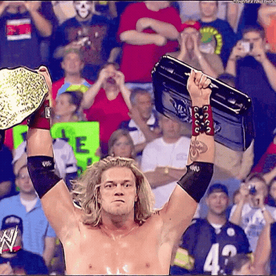 Wrestler Holding Briefcase Over Head GIF