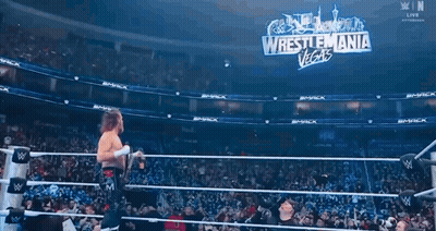 Wrestler Holding Championship Belt At WrestleMania Vegas GIF
