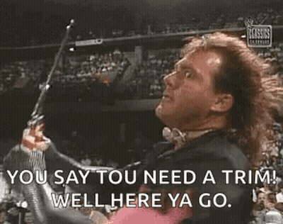 Wrestler Holding Gun Saying You Say You Need A Trim Well Here Ya Go GIF