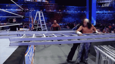 Wrestler Holding Ladder Another Behind GIF