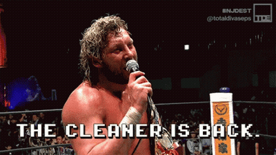 Wrestler Holding Microphone Says The Cleaner Is Back GIF