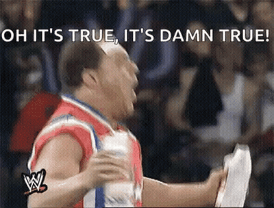 Wrestler Holding Paper Screaming At Crowd GIF