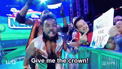 Wrestler Holding Sign Give Me The Crown GIF