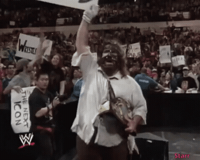Wrestler Holding Trophy Crowd Sign The Next Icon GIF