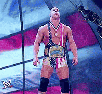 Wrestler In American Flag Outfit And Wrestling Belt GIF