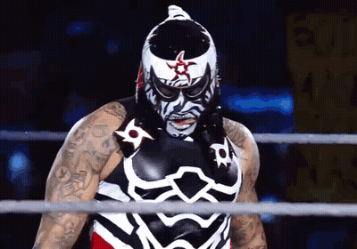 Wrestler In Black And White Costume With Star On Head GIF