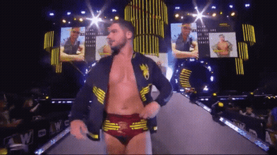 Wrestler In Black Jacket With Crown GIF